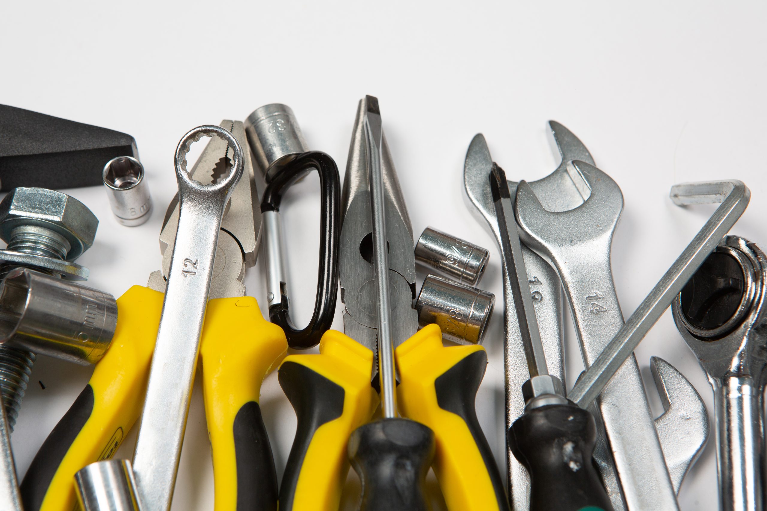 assorted-work-construction-tools-wrenches-pliers-screwdriver-top-view